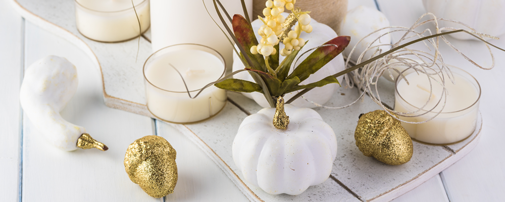 Modern fall decor trend with white and gold pumpkins